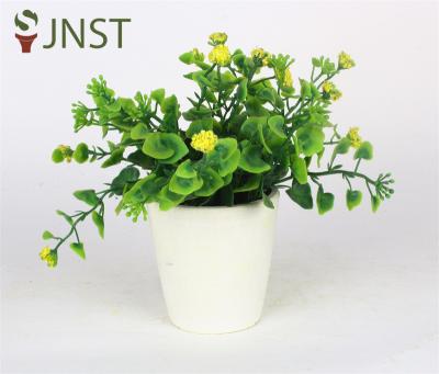 Kunstig topiary potted